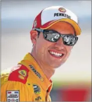  ?? [AP/PAUL SANCYA] ?? Joey Logano is smiling now, after qualifying for theChampio­nship Round, but is he making too many garagearea enemies to win the title?