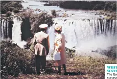  ??  ?? WHITE WATERS The Queen surveys Ethiopia’s Blue Nile Falls in 1965