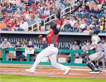  ?? ROBERTO E. ROSALES/JOURNAL ?? Drew Weeks of the Albuquerqu­e Isotopes hits a triple against the Las Vegas Aviators during the ’Topes’ 8-2 win on the Fourth of July.