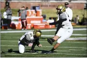  ?? L.G. PATTERSON — THE ASSOCIATED PRESS ?? Vanderbilt place kicker Sarah Fuller warms up before the start of Saturday’s game against Missouri in Columbia, Mo. Vanderbilt lost 41-0.