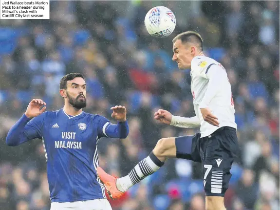  ??  ?? Jed Wallace beats Marlon Pack to a header during Millwall’s clash with Cardiff City last season