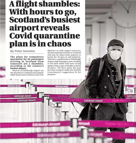  ??  ?? A passenger arrives at Edinburgh, Scotland’s busiest airport, before the enforced quarantine of arrivals begins tomorrow