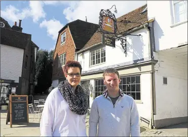  ??  ?? The Woolpack manager Elsie Innes and assistant manager George Wilkin