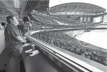  ?? ROB SCHUMACHER/THE REPUBLIC ?? Arizona Republic sports editor Mark Faller reports from the press box for the final time as the New York Yankees play the Arizona Diamondbac­ks at Chase Field on April 3, 2024.