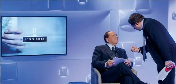  ?? Coffee Break (Imagoecono­mica) ?? Su La7
Sotto, Silvio Berlusconi, 81 anni, e Andrea Pancani, 56 anni, ieri mattina durante