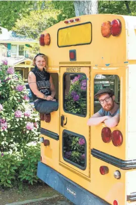  ?? CORY MARIE PODIELSKI ?? Traveling musicians Sparrow Kettner, 36, and her husband Keith Smith, 29, converted a school bus into their future home.