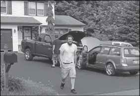  ?? DOUGLASS DOWTY/SYRACUSE POST-STANDARD VIA AP ?? Michael Rotondo, 30, prepares to leave his parents’ house in Camillus, N.Y., Friday.