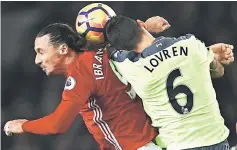  ?? — Reuters photo ?? Manchester United’s Zlatan Ibrahimovi­c (left) in action with Liverpool’s Dejan Lovren during the English Premier League football match at Old Trafford in Manchester, north west England, in this Jan 15 file photo.