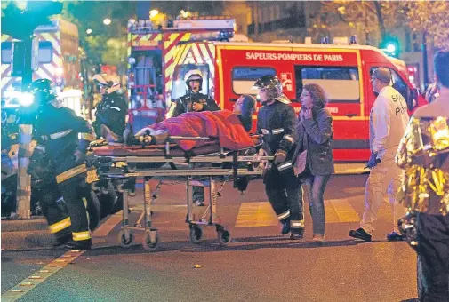  ??  ?? Scottish firefighte­rs are being given specialist training to respond to tragedies such as the 2015 Paris attacks, above.