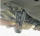  ??  ?? Replacemen­t exhaust strap in place and everything back to normal down below.