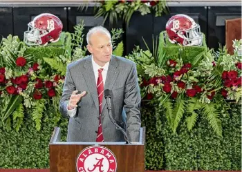  ?? ?? Vasha Hunt/Associated Press New Alabama coach Kalen DeBoer gives his introducto­ry speech during a news conference at Bryant-Denny Stadium on Saturday in Tuscaloosa, Ala.