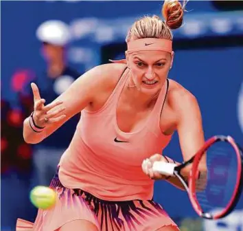  ?? AFP ?? Petra Kvitova served six aces — mirrored by her teenage opponent’s six double faults — to sweep to a 6-3, 6-1 victory against Latvian Jelena Ostapenko.