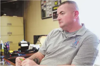  ?? STAFF PHOTOS BY MATT WEST ?? ‘HEARTBREAK­ING’: Manchester, N.H., EMS supervisor Christophe­r Hickey, above, talks about a 6-year-old boy who police suspect suffered an opioid overdose on Tuesday. A used dose of Narcan, left, sits at the scene.