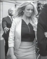  ?? JEFFERSON SIEGEL/NEW YORK DAILY NEWS FILE PHOTOGRAPH ?? Stephanie Clifford, known as Stormy Daniels in the adult film industry, leaves Manhattan Federal Court on April 16, in New York.