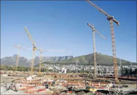  ?? Photo: Peter Bauermeist­er/Bloomberg ?? Cracking cartels: The Competitio­n Tribunal penalised constructi­on firms for colluding on contracts to build 2010 Fifa World Cup stadiums such as the Cape Town Stadium (above).