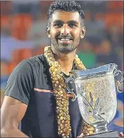  ?? HT PHOTO ?? Prajnesh Gunneswara­n with the trophy.