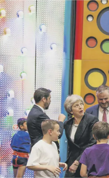  ??  ?? 0 Theresa May visits a climbing wall in Lancashire, yesterday, during campaignin­g for the local elections while her deputy said the government didn’t see any evidence that there is a demand for a second independen­ce referendum