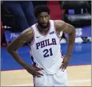  ?? MATT SLOCUM - THE ASSOCIATED PRESS ?? Sixers center Joel Embiid played an entire series against Atlanta with a torn meniscus in his right knee. It appeared to hamper him despite Embiid’s putting up impressive numbers during the sevengame loss to the Hawks.