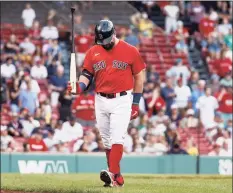  ?? Winslow Townson / Associated Press ?? The Red Sox’s Kyle Schwarber heads back to the dugout after striking out during the 10th inning against the Rays on Monday in Boston.