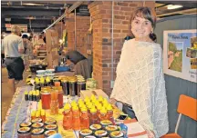  ?? DESIREE ANSTEY/ JOURNAL PIONEER ?? Heather Mills sells buckwheat and clover honey from B’Haven Farm, which is located in Tignish.