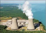  ?? NEWS-HERALD FILE ?? FirstEnerg­y Perry Nuclear Power Plant in North Perry Village is powered back up Aug. 6 after a July 27 outage.