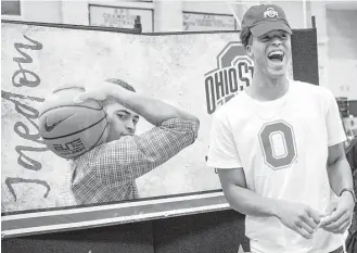  ?? Brett Coomer / Houston Chronicle ?? Jaedon LeDee smiles as he gets ready to sign a national letter of intent to play basketball at Ohio State during a signing day ceremony at the Kinkaid School on Wednesday.