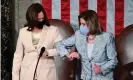  ?? Photograph: Getty Images ?? Kamala Harris and Nancy Pelosi greet one another at Biden’s first address to Congress.