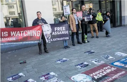  ?? Photo /Washington Post ?? Supporters of WikiLeaks founder Julian Assange have made their feelings known in London.