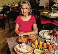  ?? ?? Nalini Srinivasan, Owner pictured in the dining room at The Curry Queen in Old Saybrook on Aug. 29.