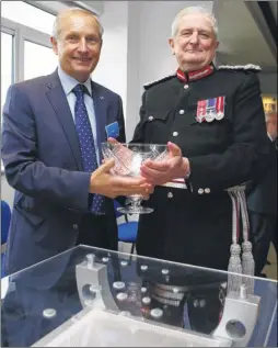  ??  ?? Polypipe Terrain CEO David Hall receives the award from Lord Lieutenant of Kent, Viscount De L’Isle