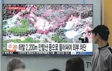  ?? Foto: AP ?? Konec? Jihokorejc­i sledují v televizi zničení jaderné střelnice.