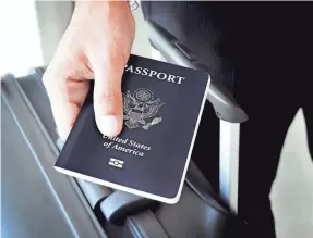  ?? KRITCHANUT/GETTY IMAGES ?? The U.S. State Department issued 11.7 million passports and passport cards to Americans in 2020, down from 20.7 million in 2019.