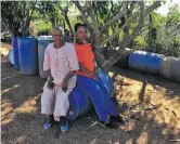  ?? ?? RAMADIMETJ­A (LEFT) AND DAUGHTER RAISIBE SELEMA SPEND PART OF THE ELDERLY WOMAN’S OLD AGE PENSION TO BUY WATER EVERY MONTH.