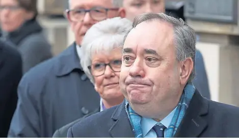  ??  ?? Alex Salmond leaves the High Court in Edinburgh after he was cleared of 13 charges of sexual assault. Craig Murray has been accused of committing a contempt of court during the trial.