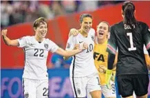  ?? ANDRE PICHETTE/EPA ?? USA’s Meghan Klingenber­g (left), Carl Lloyd, Andressa Alves and Hope Solo celebrate after their victory over Germany in the semifinals.