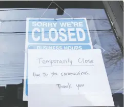  ?? Cole Burston / Bloomberg ?? The federal government will offer wages subsidies of up to 75 per cent to small businesses affected by the COVID-19 pandemic.