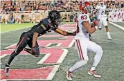  ?? [PHOTO BY NATE BILLINGS, THE OKLAHOMAN] ?? Oklahoma wide receiver Nick Basquine hauls in a touchdown against Texas Tech in 2016. Basquine, who missed the 2017 season with a torn Achilles, will miss spring practices this year after tearing his other Achilles last week.