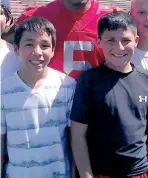  ?? COURTESY OF JIMMY GALLEGOS ?? Isaac Chavez, left, and Jimmy Gallegos are shown as 11-year-olds at a UNM camp. Both are now producitve RBs at Volcano Vista.