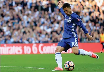  ??  ?? Eden Hazard scores his side’s third goal during the FA Cup semi-final between Chelsea and Tottenham