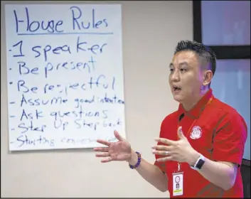  ?? L.E. Baskow Las Vegas Review-Journal @Left_Eye_Images ?? Duy Nguyen of the Asian Community Developmen­t Council talks Saturday to volunteers about the 2020 census.