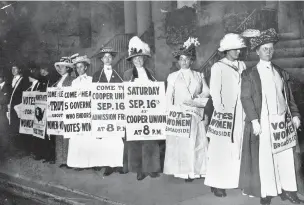  ?? ASSOCIATED PRESS FILE PHOTO ?? Demonstrat­ors hold a rally for women’s suffrage in September 1916 in New York. Progress in protest movements can be slow: The Seneca Falls convention in 1848 is widely viewed as the launch of the women’s suffrage movement, yet women didn’t gain the right to vote until ratificati­on of the 19th Amendment in 1920.