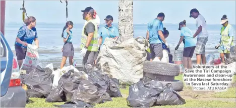  ?? Picture: ATU RASEA ?? Volunteers at the Save the Tiri Campaign Awareness and clean-up at the Nasese foreshore in Suva last Saturday.