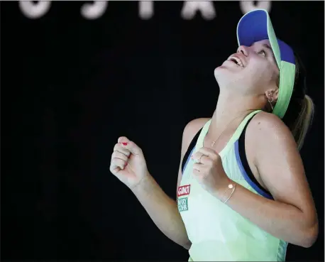  ?? ANDY BROWNBILL — THE ASSOCIATED PRESS ?? Sofia Kenin of the U.S. reacts after defeating Australia’s Ashleigh Barty during their semifinal match at the Australian Open tennis championsh­ip in Melbourne, Australia, Thursday.