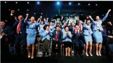  ?? PHOTOS BY XINHUA ?? The Beijing delegation celebrates after winning the right to host the 2022 Winter Olympics and Paralympic­s on July 31, 2015.