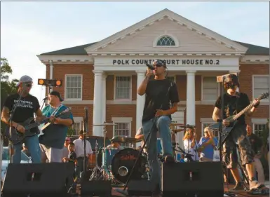  ?? Kevin Myrick/ SJ ?? Cedartown rock band, Chaotic, opened up the Fourth Friday concert series in downtown Cedartown on June 27. The next concert will be on July 25. For more photos