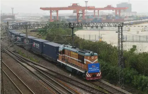  ?? XINHUA PIC ?? The 1,000th Chinese freight train to Europe departing from the Yiwu West Railway Station in Yiwu, Zhejiang Province, recently. The number of Sino-European freight train services this year has increased by 612, or 158 per cent, compared with the same...