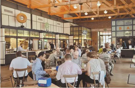  ??  ?? VARIETY IS THE SPICE OF LIFE: The Bottling Department Food Hall at Pearl, above, features six vendors selling food, drinks and sweets. Below, the San Antonio Botanical Garden has a new teaching kitchen, where people can learn how to grow veggies and...