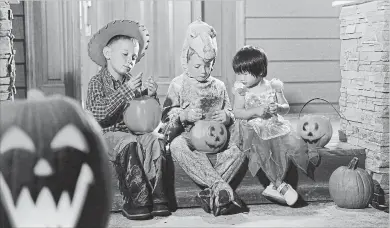  ?? GETTY IMAGES/ISTOCKPHOT­O ?? We should raise children who enjoy eating a variety of nutritious foods and can learn to eat in a balanced way, even when it comes to Halloween candy.