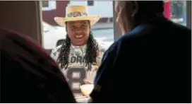  ?? RICK KAUFFMAN – DIGITAL FIRST MEDIA ?? Latifah Griffin and her whole family have been lifelong customers of May’s Water Ice in Chester and Tuesday was the first day for a cold one.