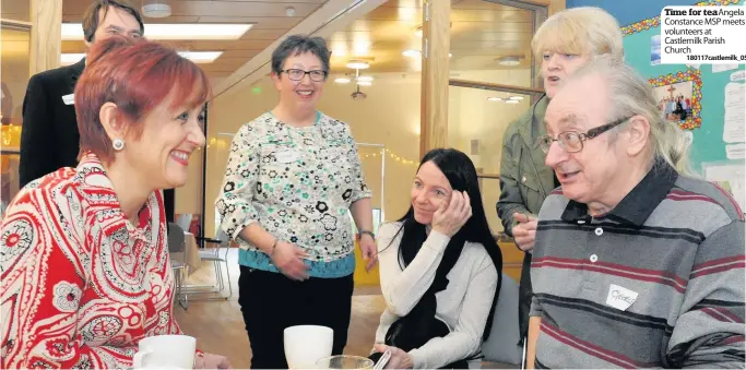  ??  ?? Time for tea Angela Constance MSP meets volunteers at Castlemilk Parish Church